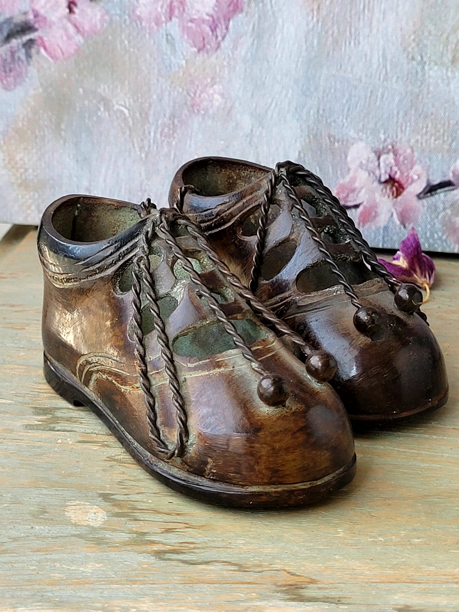 Pareja con cordones trenzados — detalle